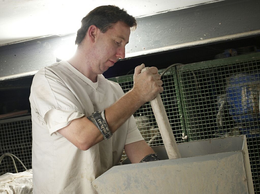 Preparing clay by hand at Nicholas Mosse Pottery